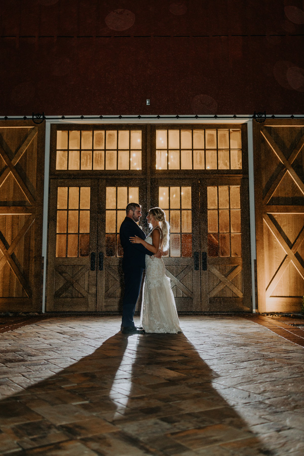 Bride and Groom in front of the picturesque barn doors